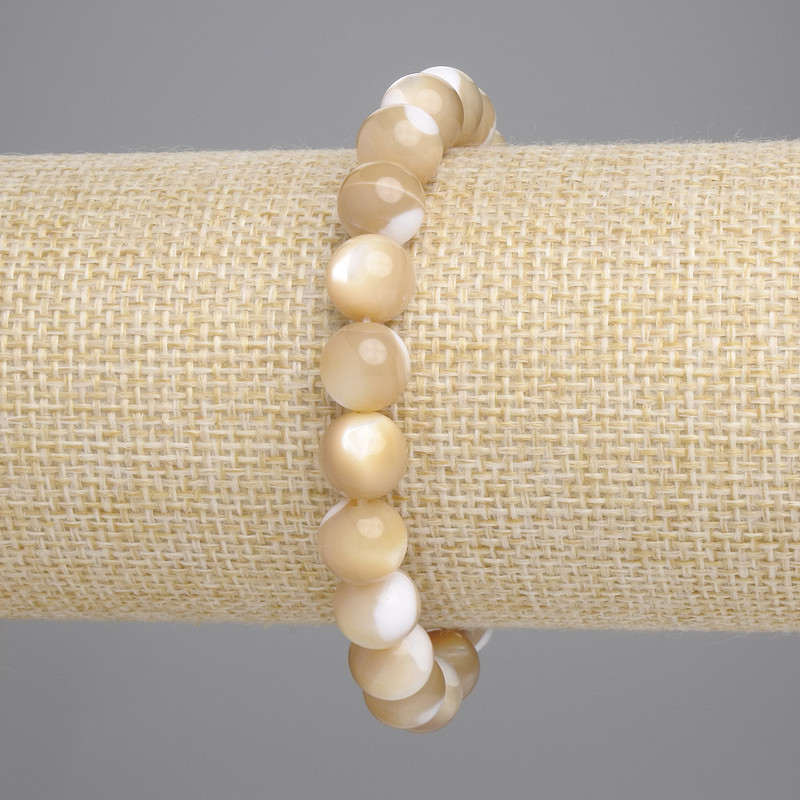 Beige mother-of-pearl bracelet with smooth beads, 8.5 mm diameter, 18 cm length, stretch
