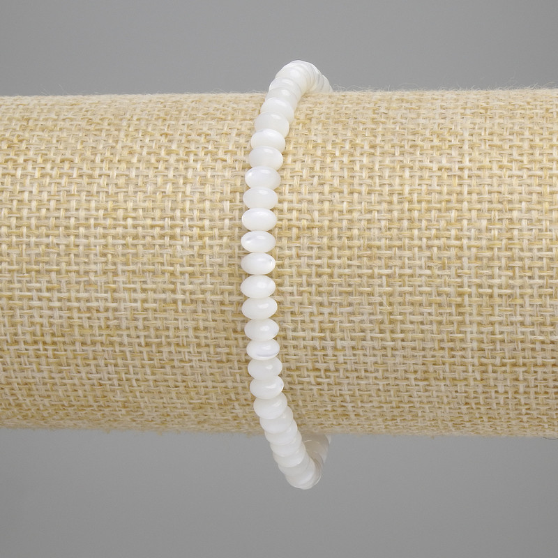 Bracelet with Mother-of-Pearl Rondelles, approx. 5×2 mm diameter, 18 cm length, stretch