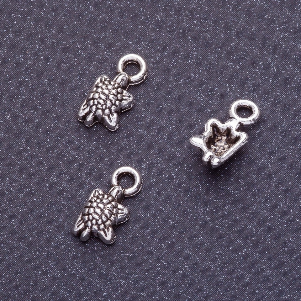 Sea Turtle Pendant Findings, length 11x5 mm, hole Ø1.5 mm, silver-colored finish, 20 g packaging, ±62 pcs