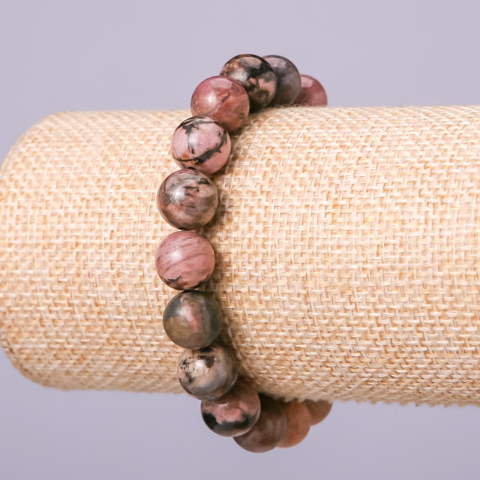 Elastic bracelet made of natural rhodonite with smooth beads, 12 mm diameter, 18 cm long