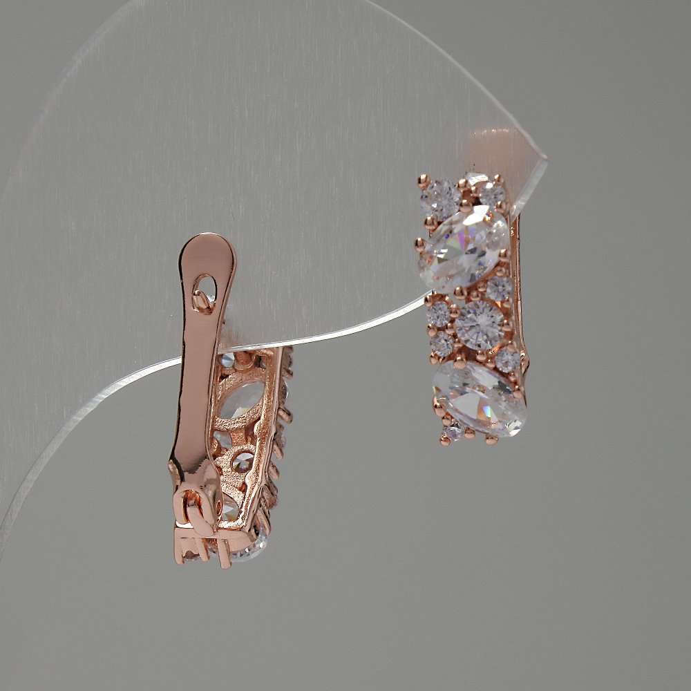 Earrings with white crystals 17x6 mm in golden metal