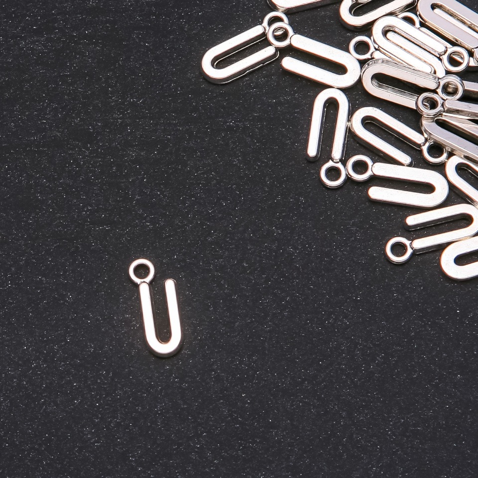 Pendant findings Letter 'U' 17x7 mm packaging 20 g (+- 30 pcs)
