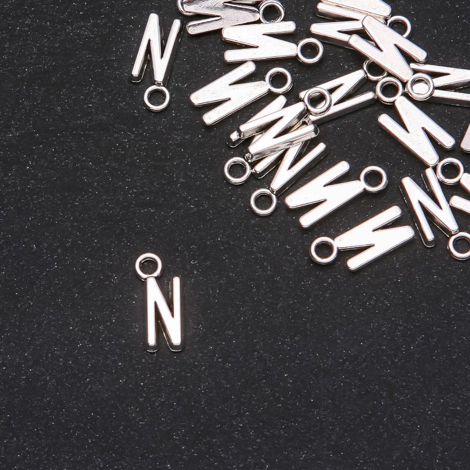Pendant hardware Letter 'N' 17x7mm packaging 20 g (± 25 pcs)