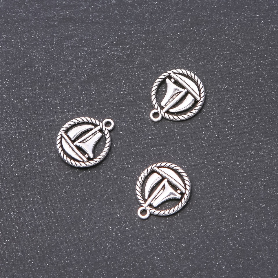 Boat Pendant 15x18mm, packaging 20 g +/- 14 pcs