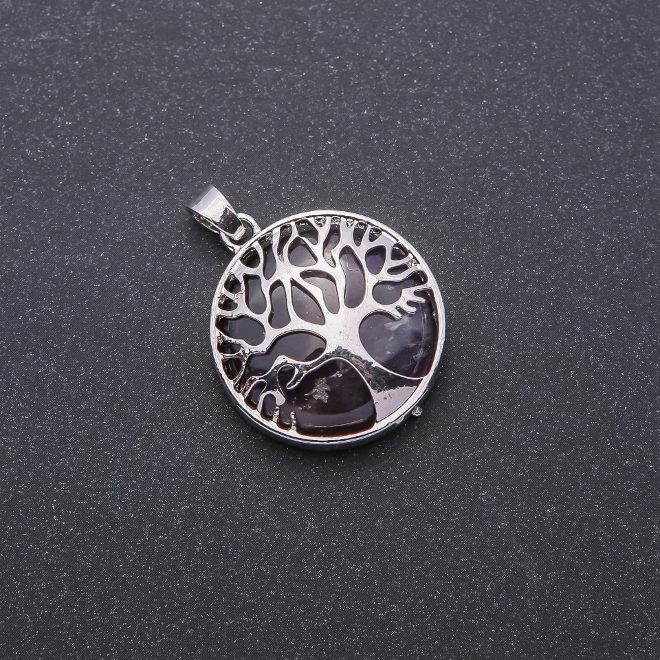Pendant with natural amethyst in a 'Tree' setting, diameter 27mm