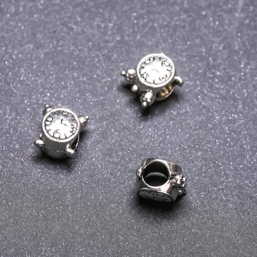 Findings insert 'Watches' 9×9 mm, inner diameter 4.5 mm, fac. 20 g +/- 14 pcs