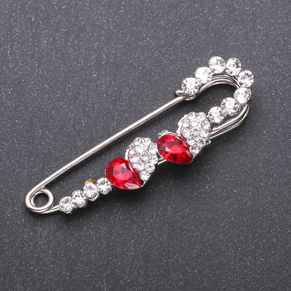Brooch pin with red glass crystals, 67×18 mm, white metal