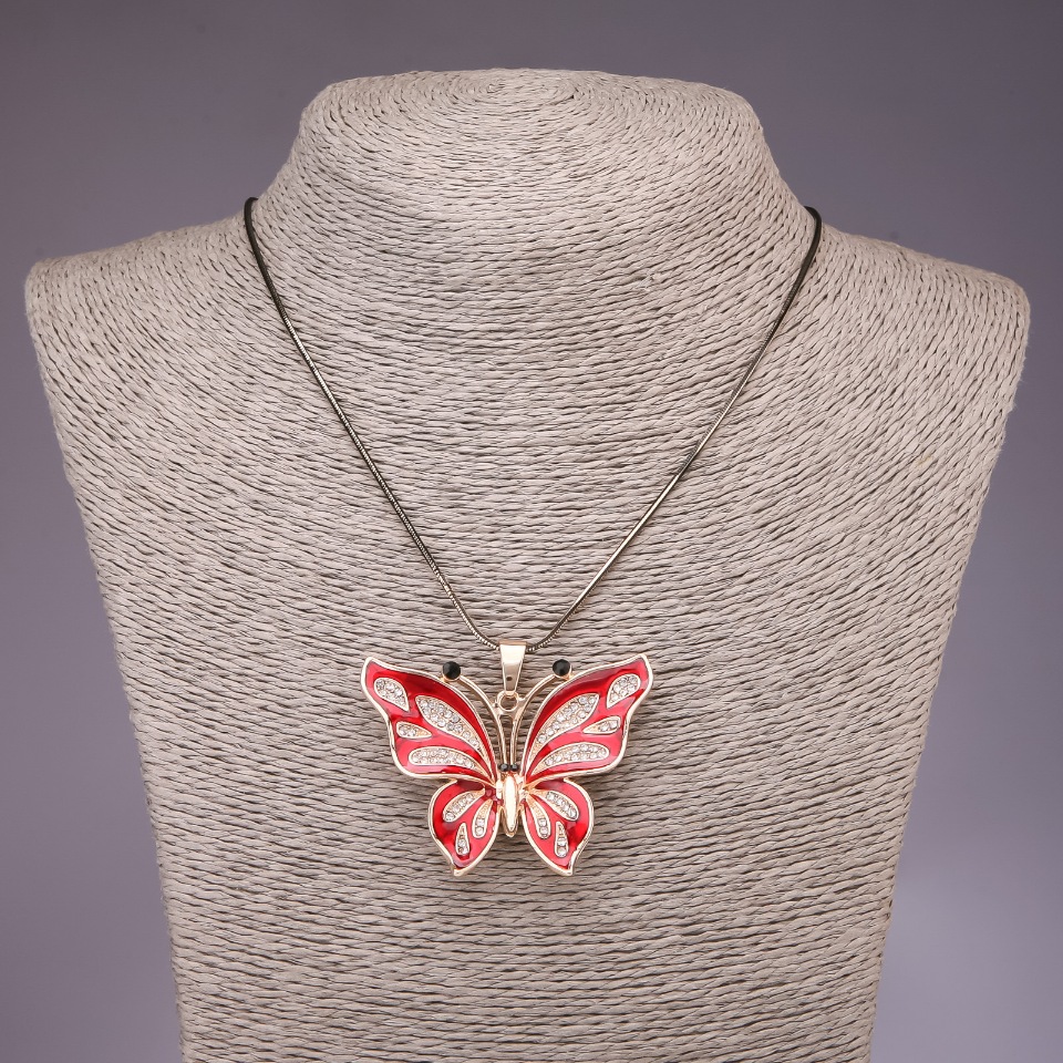 Pendant 'Butterfly' on a long chain in a 'black gold' shade, diameter 54×44 mm, length 85 cm