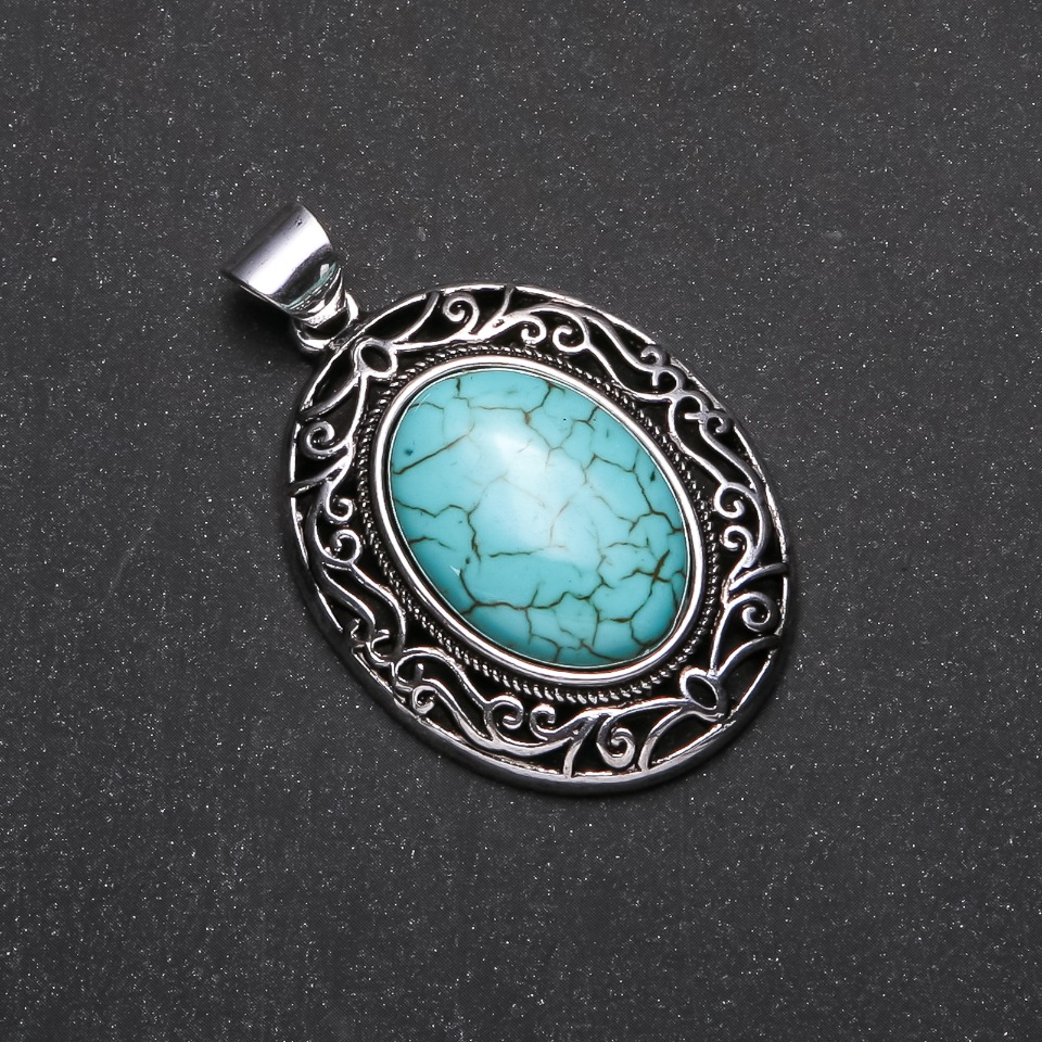 Pendant with natural turquoise stone in antique-style setting 33×40×52 mm