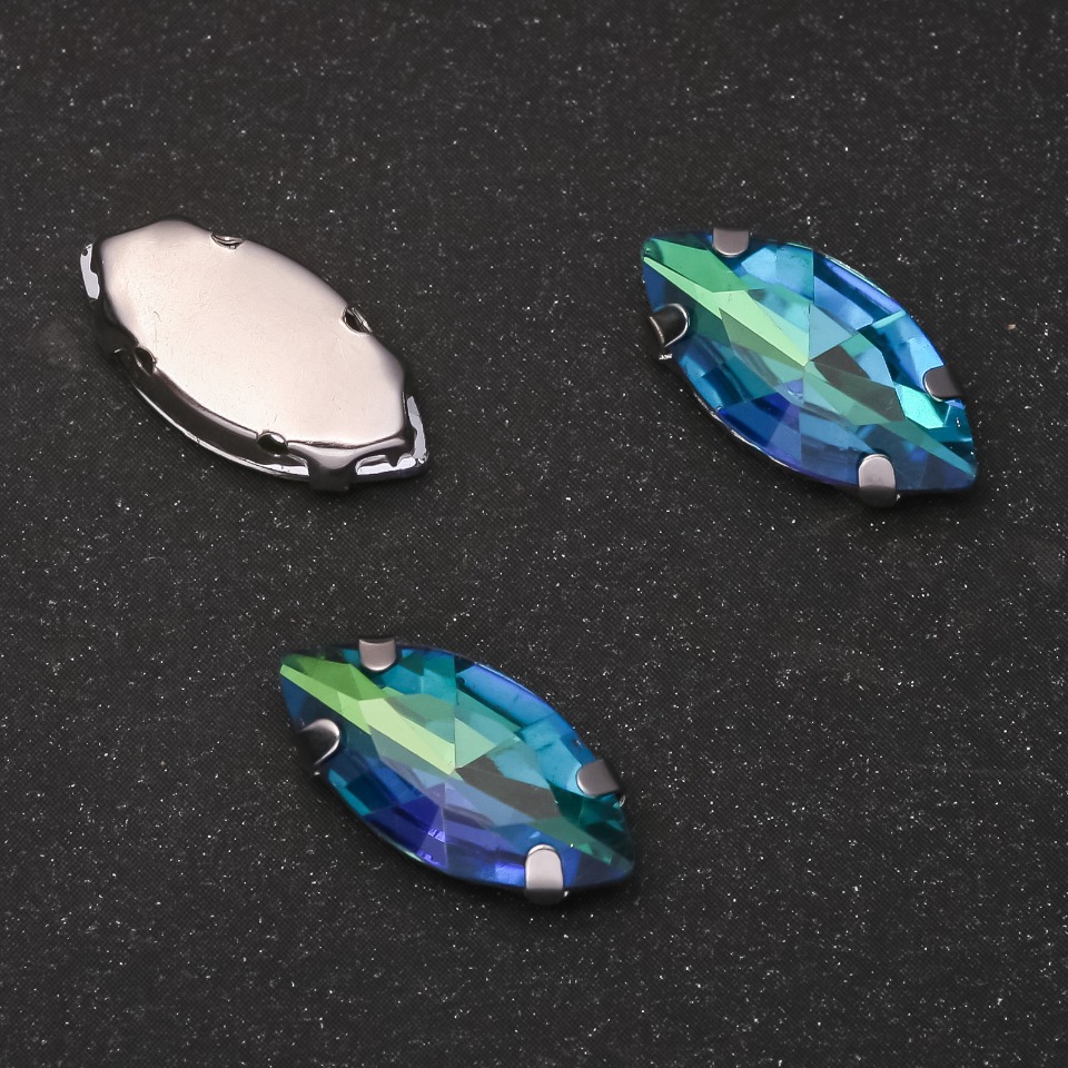 Price per pack / 10 pcs. Sew-on crystal in cap Oval 9x18mm green-blue