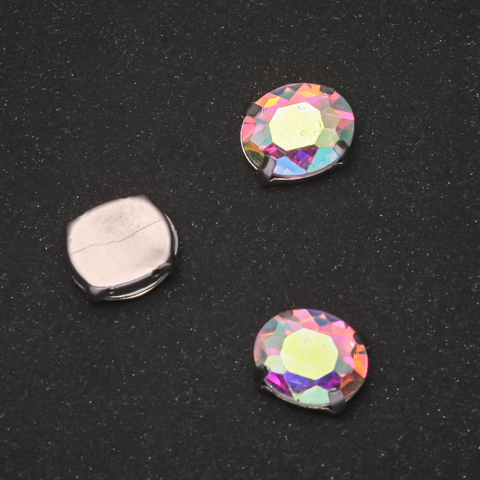 Price per pack / 10 pcs. Rainbow sew-on crystal in oval setting 8×10 mm