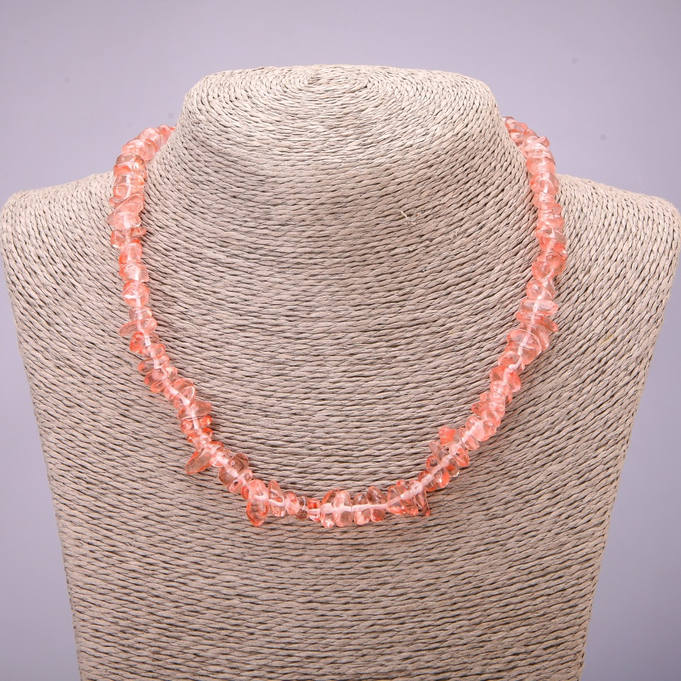 Necklace of tinted rock crystal chips, natural stone, approximately 8 mm in diameter, length 45–50 cm with extension chain