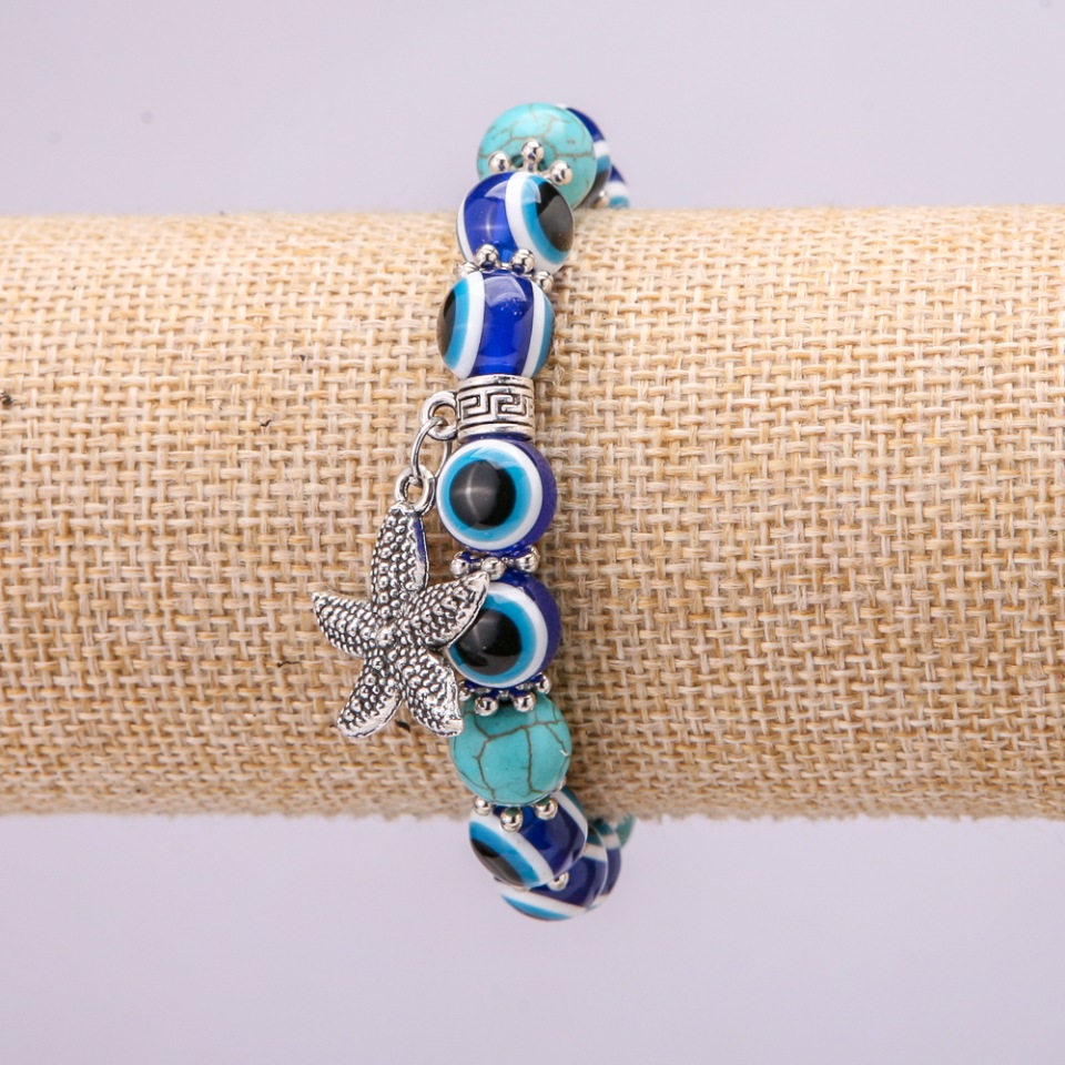 Talisman Bracelet on Elastic Turquoise with Blue Eyes, diameter 10(+-)mm, length 18cm with inserts and a Sea Star pendant