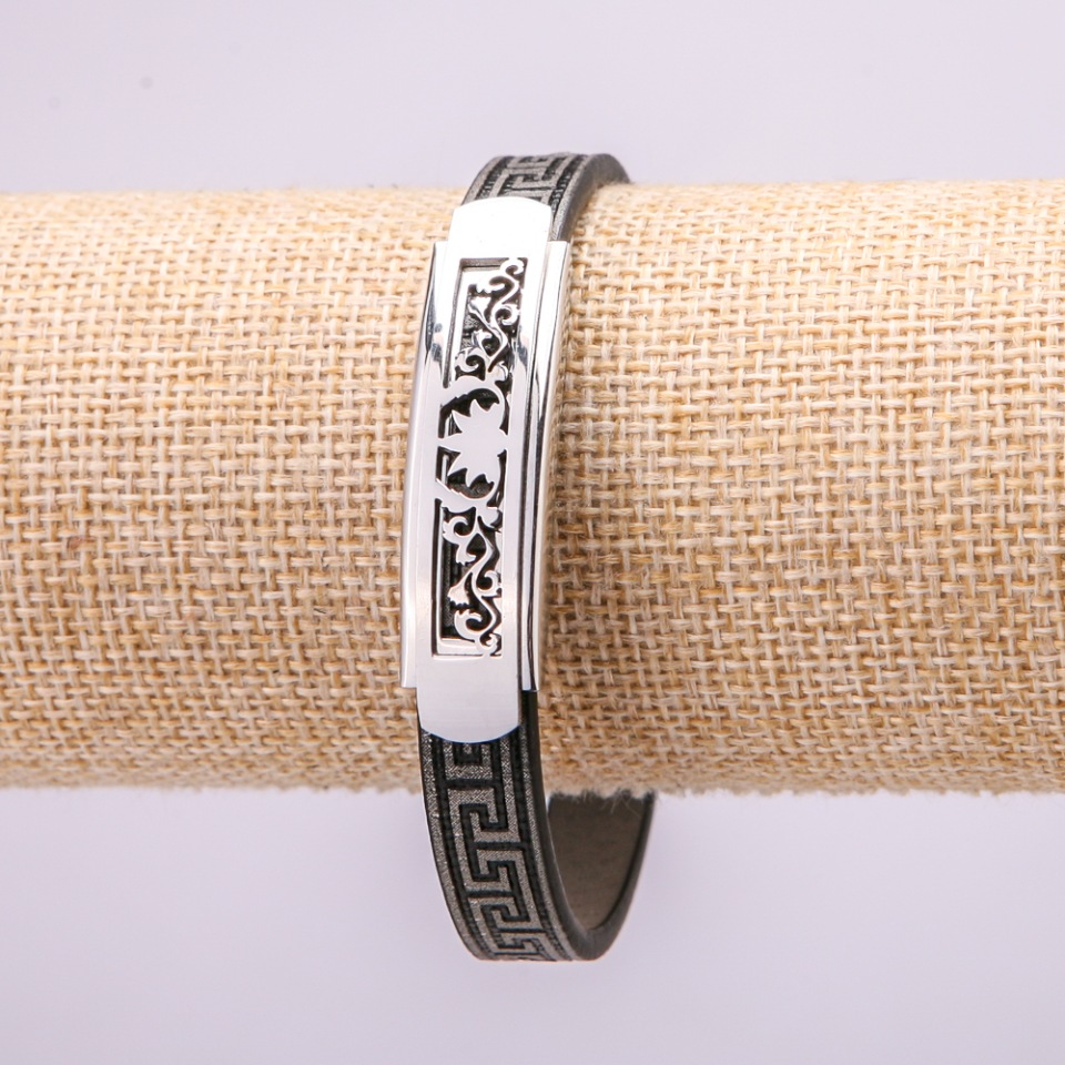 Bracelet with metal inlays, 21 cm long, 10 mm thick, rubber, gray color, with clasp