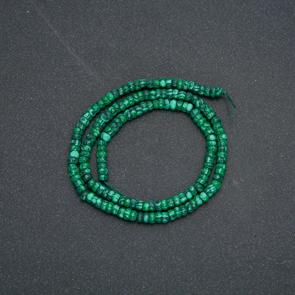 Bead strand of malachite natural stone (pressed) faceted rondelle, diameter 4x2.5 mm, length 39 cm +