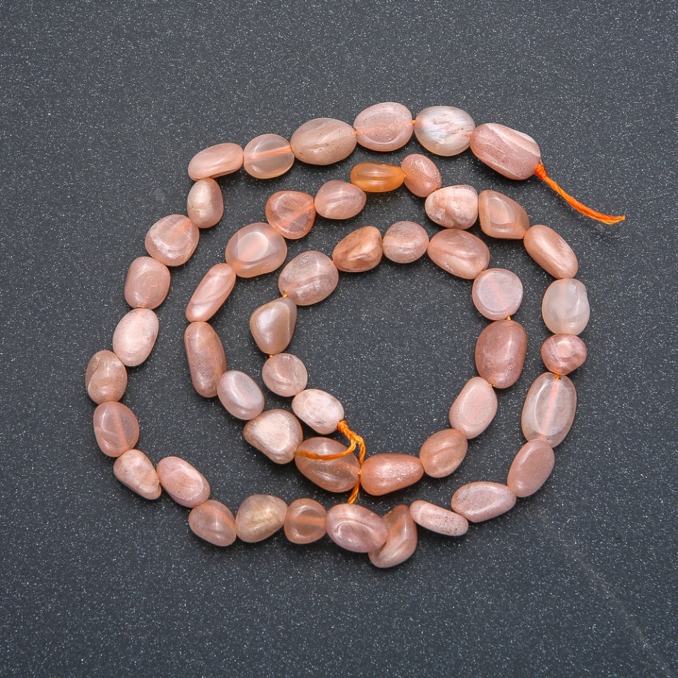 Beads on a thread of natural selenite, faceted, diameter 10x7 mm, length 40 cm +