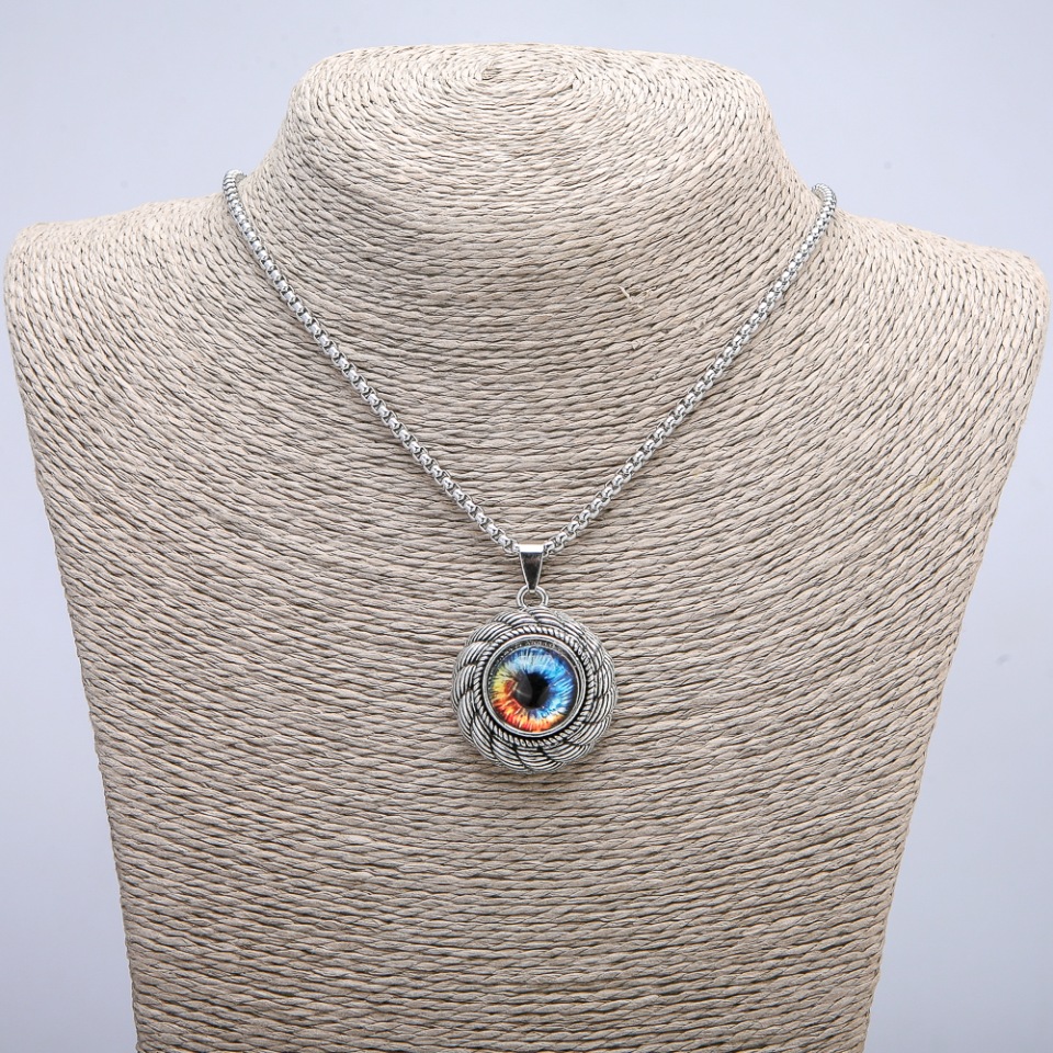 Pendant 'Eye' in a bezel 45x30 mm on a chain, length 70 cm, silver-colored metal