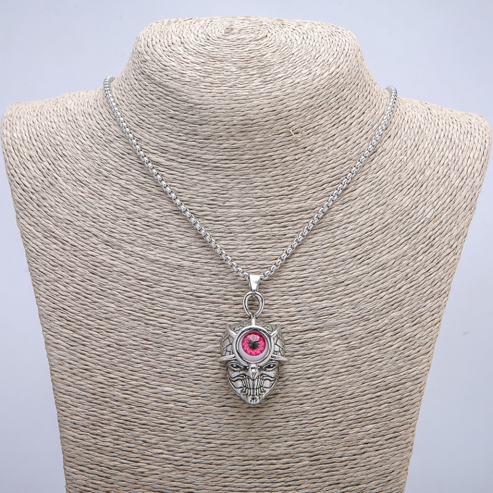 Pendant 'Skull with an Eye' 45x27 mm on a chain, length 70 cm silver-toned metal
