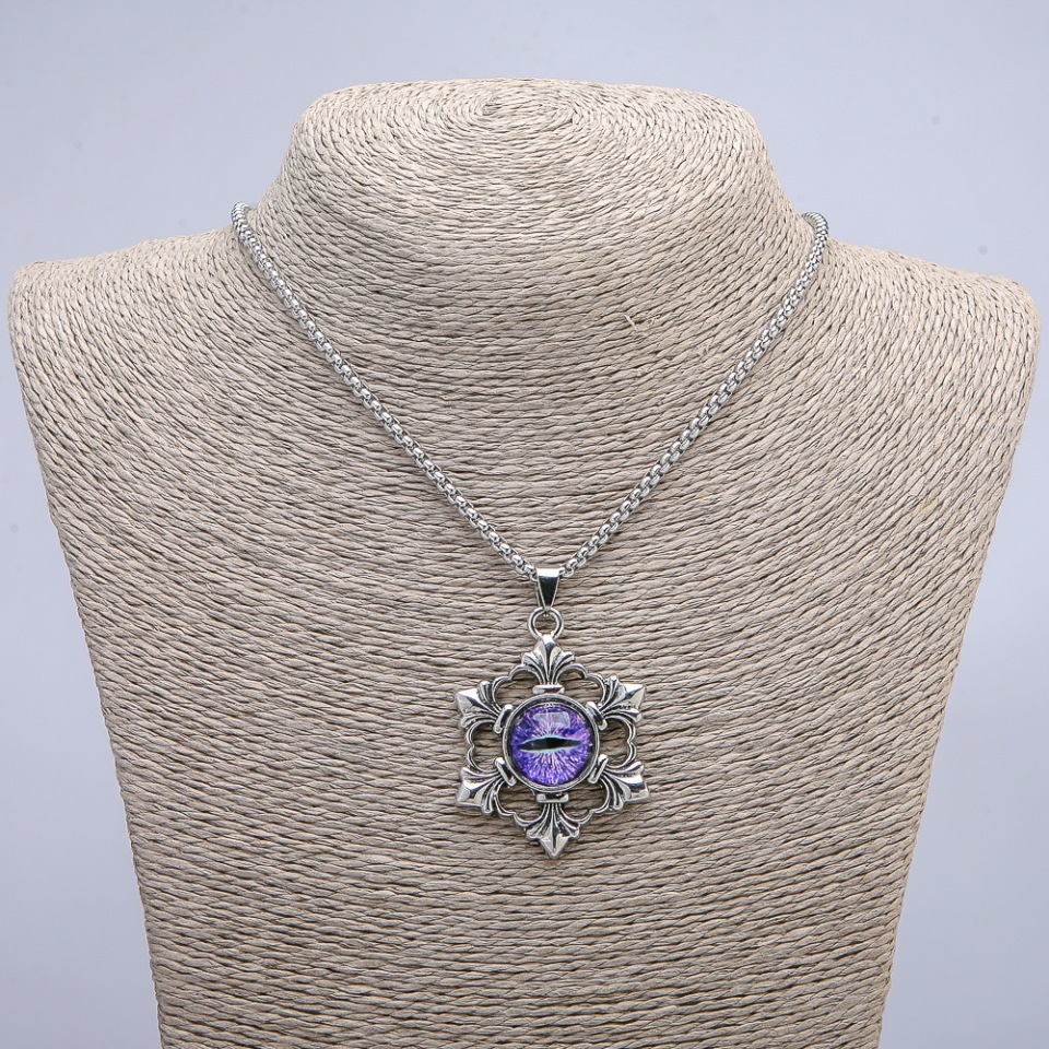 Pendant "Dragon Eye in a Frame" 50x35 mm on a chain, length about 70 cm; silver-toned metal