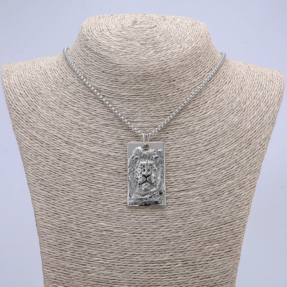 Pendant "Lion" 50x26 mm on chain, length 70 cm, silvery metal