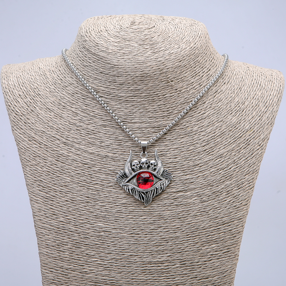 Pendant 'Eye of the Demon' 45x40 mm on a chain, length 70 cm, silver-colored metal