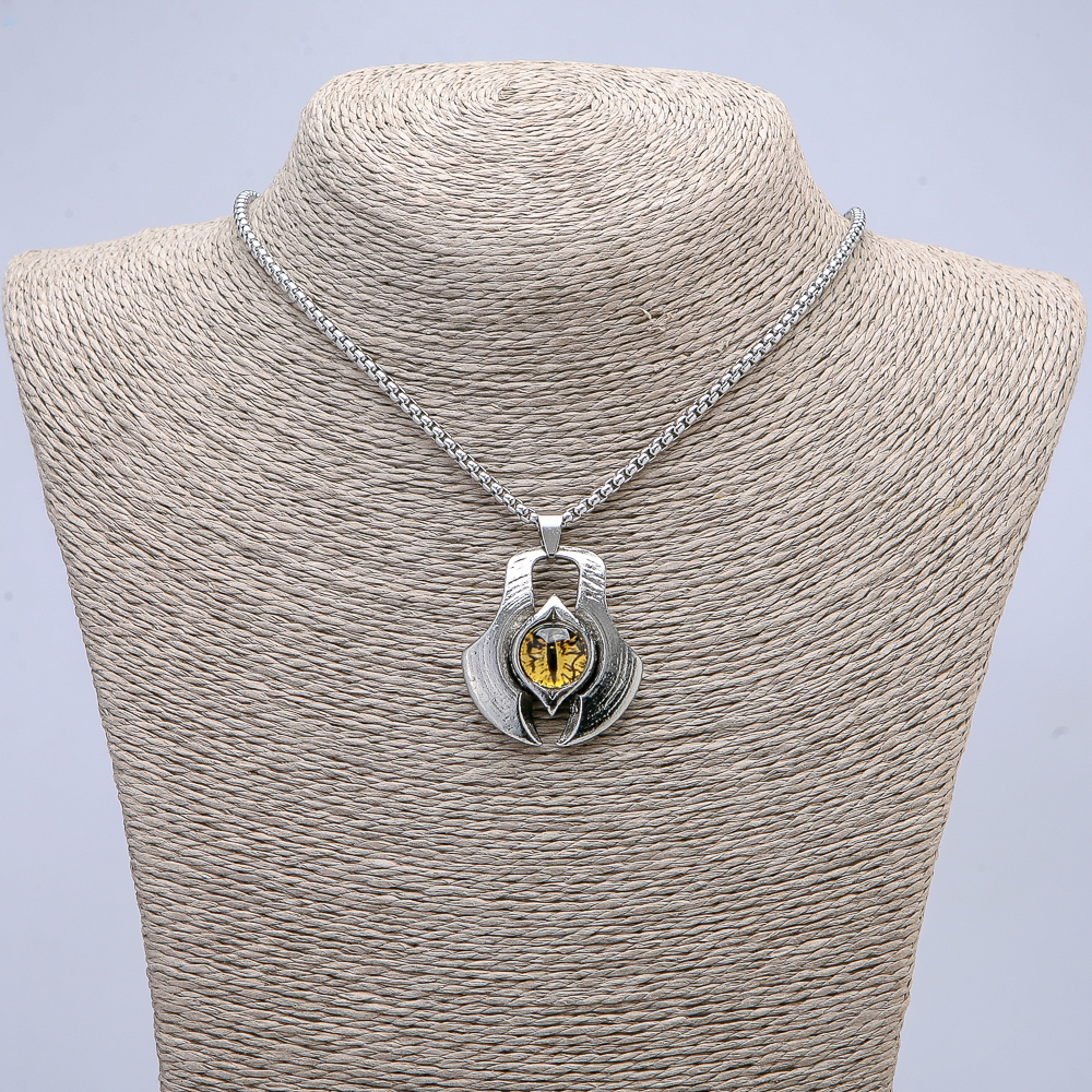 Pendant \"Dragon Eye\" in a bezel setting, 43×35 mm, on a chain, length 70 cm, silver-colored metal