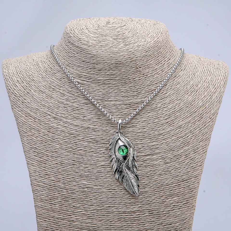 Pendant 'Feather with the Dragon's Eye' 65x23 mm on a chain, length 70 cm +/- silver-toned metal