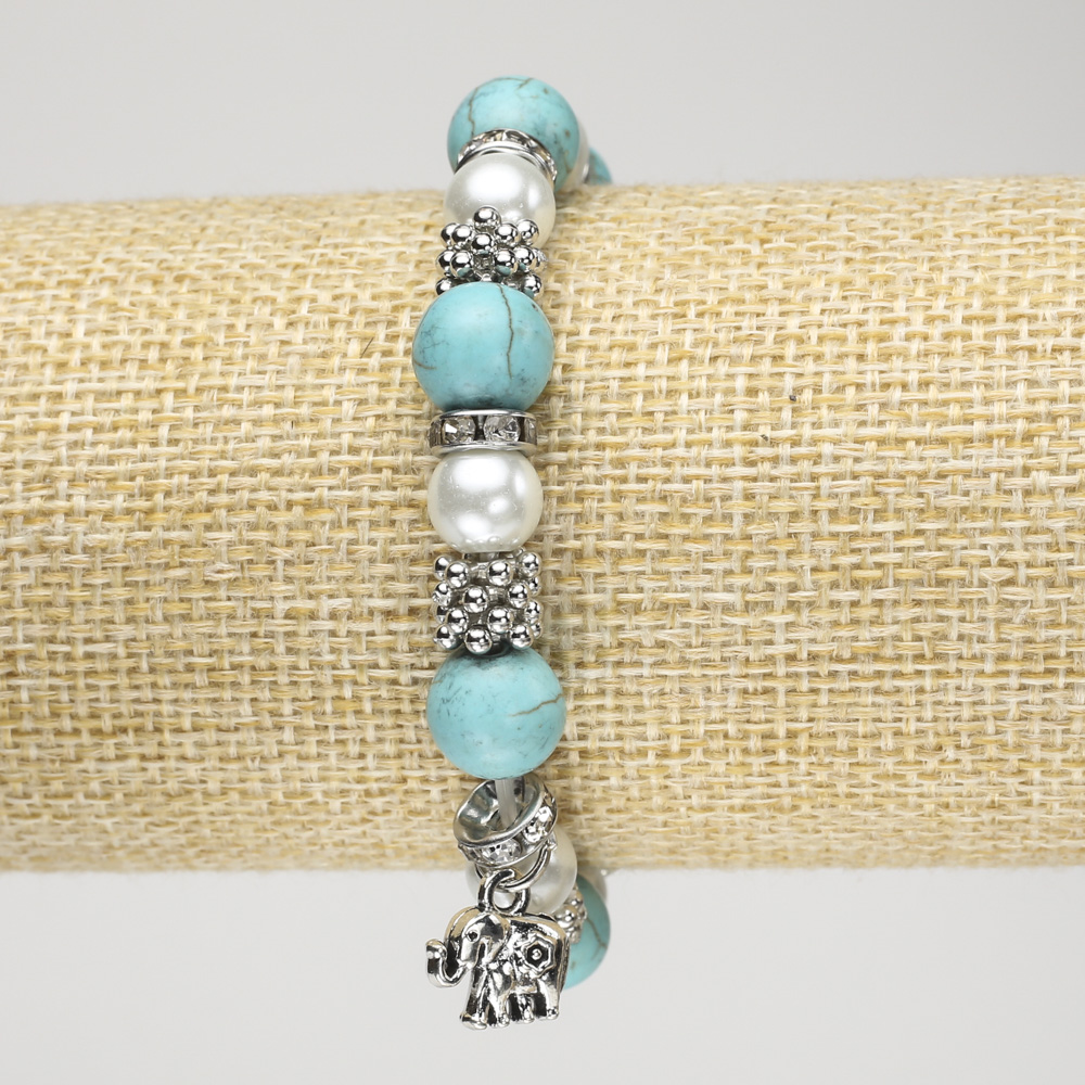 Bracelet Turquoise (Synthetic) on Elastic, with Faux Pearls (Synthetic), Silver-Toned Inserts and Elephant Charm, Length 18 cm+