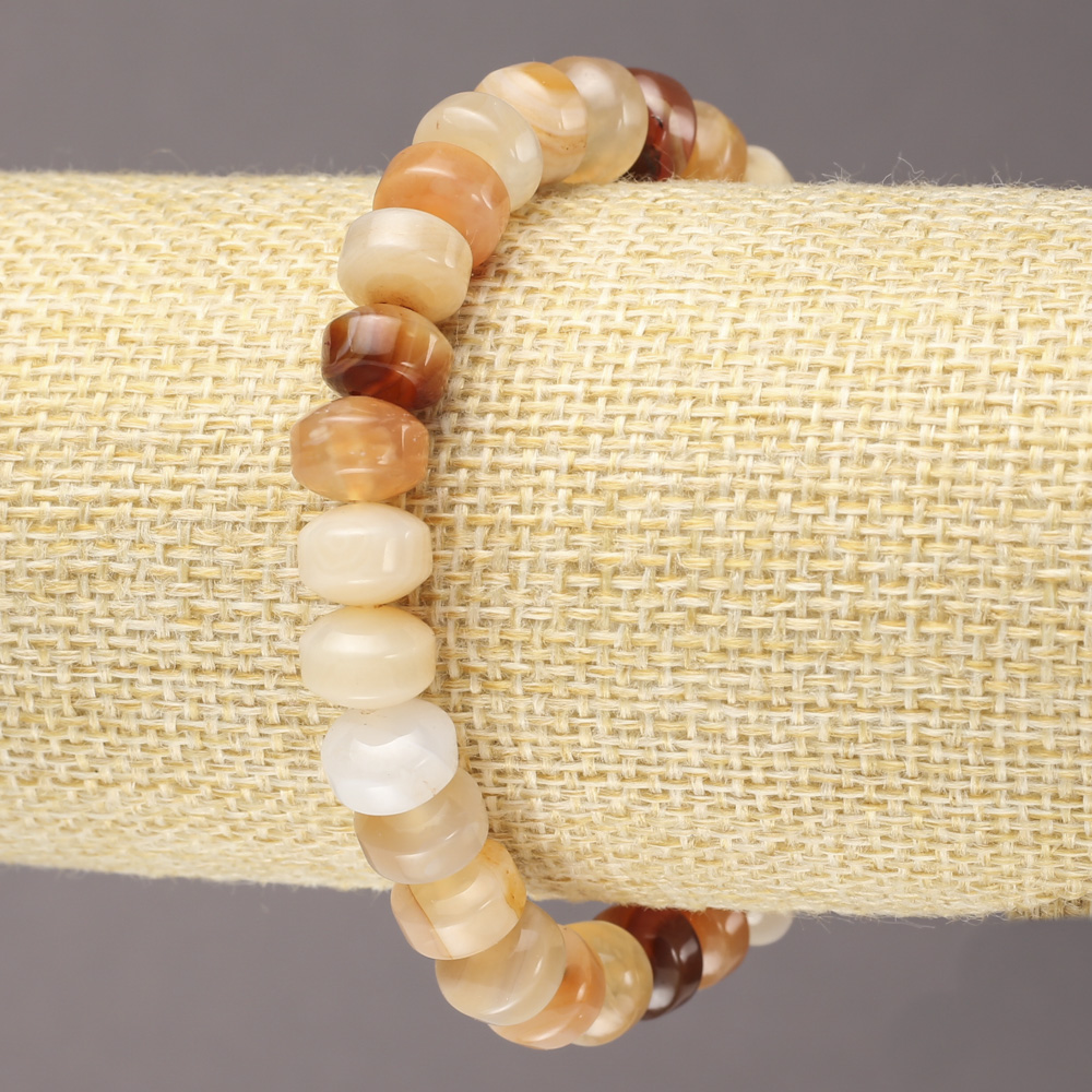 Elastic bracelet with natural carnelian, smooth rondels, diameter 9×7 mm+