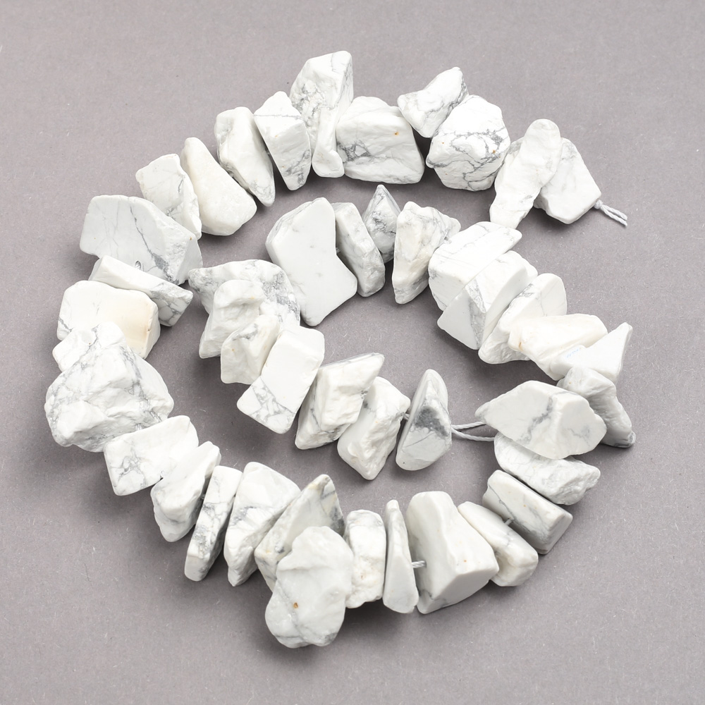 Unpolished Howlite Beads on a Thread, Faceted, Diameter 15×25 mm, Length 42 cm ±