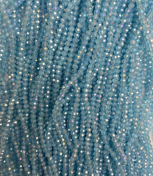 Blue transparent Czech crystal beads on beading wire with petrol iridescence, faceted rondelle, diameter 3.5x3 mm + -, length 36 m +