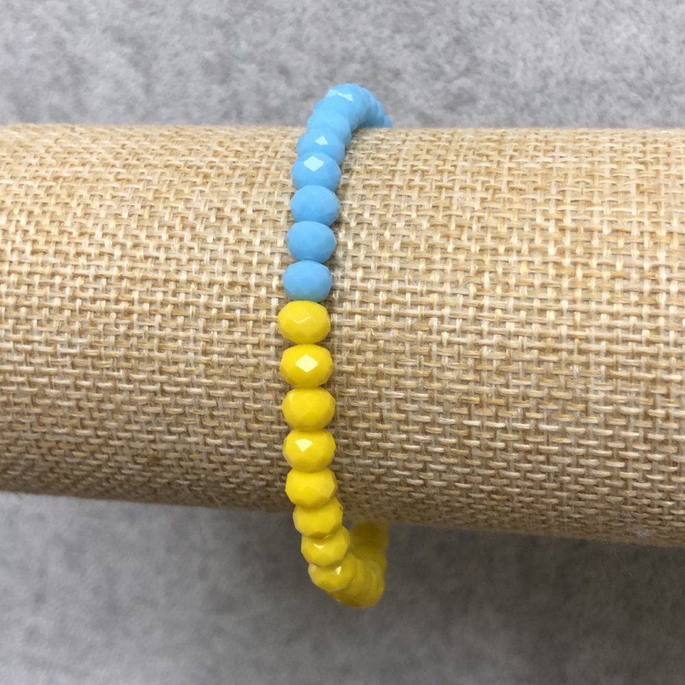 Elastic bracelet with Czech crystal 'Ukraine' faceted rondel, diameter 6×4 mm, length 18 cm