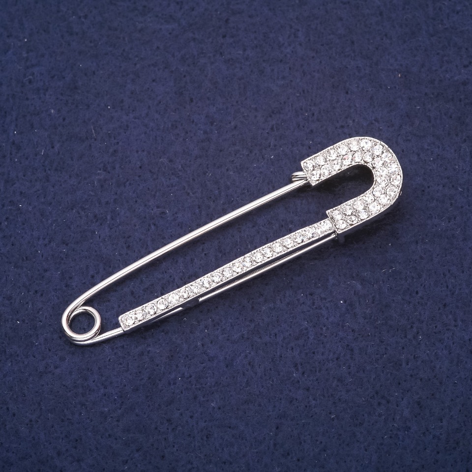 Brooch pin with white crystals 72x18 mm silver metal