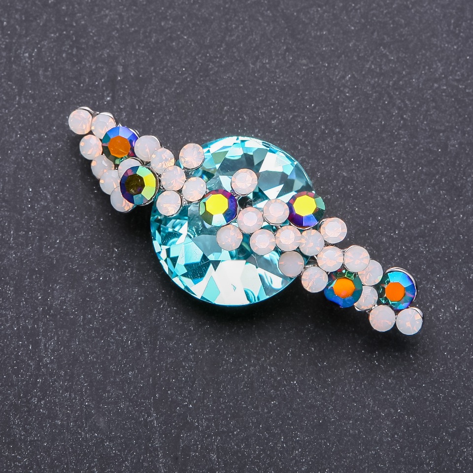 Planet Brooch with silver-toned metal, blue crystal and rhinestones 65x25mm +