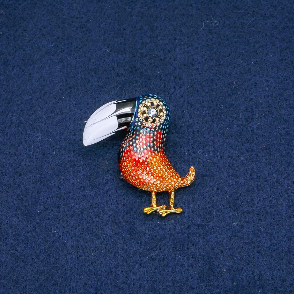 Toucan Brooch, black-and-white enamel, gray rhinestone, golden metal 40x35mm +