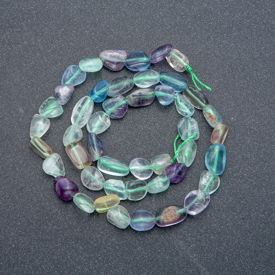 Beads on a thread of natural fluorite, faceted, 7x9 mm, length 39 cm +