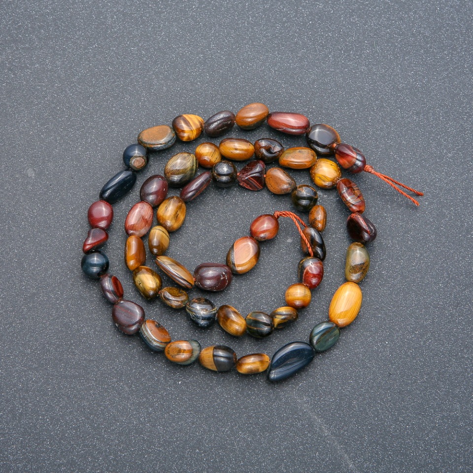 Beads on a string of natural stones Tiger's Eye, Hawk's Eye, Bull's Eye faceted, diameter 8×6 mm, length 40 cm +