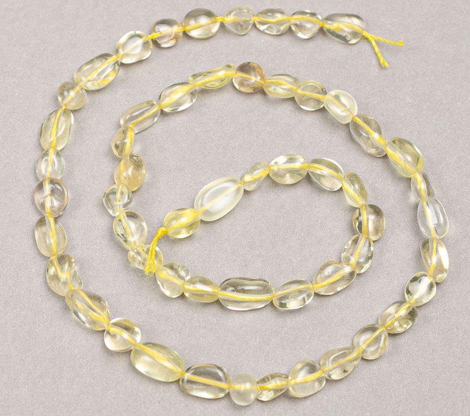 Citrine beads on thread 'Faceted', diameter 6-7x7-10 mm, length 40 cm +