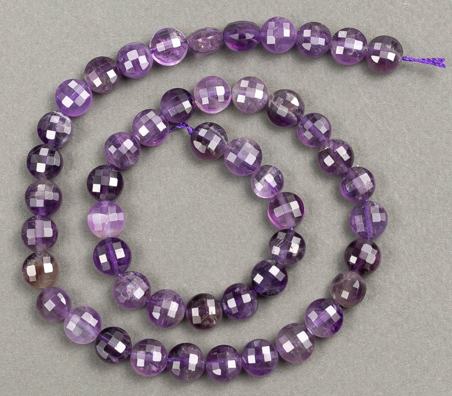 Bead strand of natural amethyst, faceted coin-shaped, 8x5 mm diameter, length 40 cm +