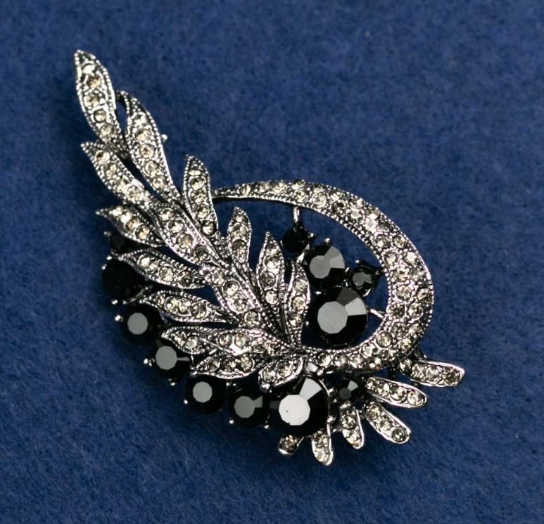 Brooch 'Leaves' with white and black crystals, silver-colored metal 72x37mm