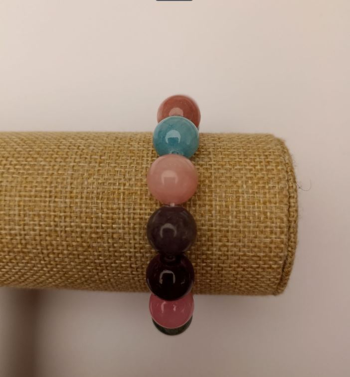 Elastic bracelet with toned quartz 'Assortment' (artificial acrylic) smooth beads, diameter 12.5 mm, length 18 cm