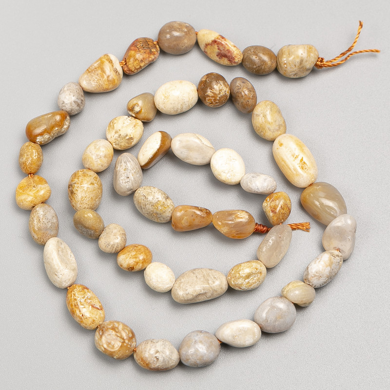 Beads of Fossilized Coral Stone, tumble-polished on thread, 7×9mm diameter, 40cm length