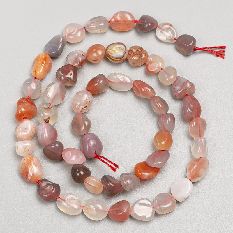 Carnelian beads, faceted, on a string, diameter 6x8 mm, length 38 cm