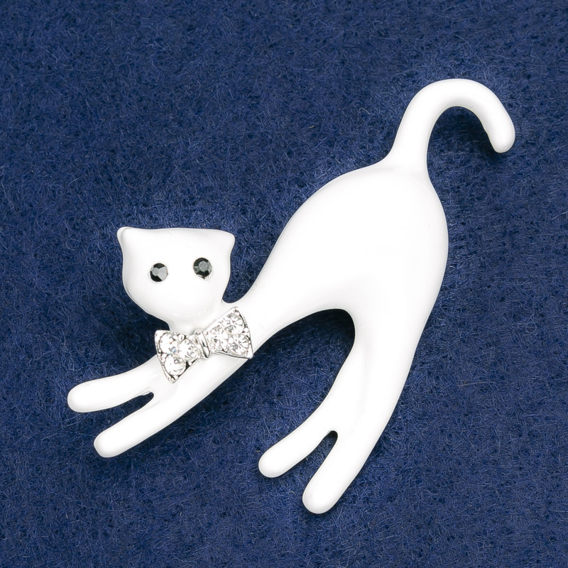 Brooch 'Kitty' made of white acrylic with white crystals, silver metal 66 x 41 mm