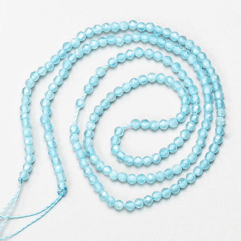 Small synthetic spinel beads, blue, faceted 2 mm rounds on thread, 37 cm length