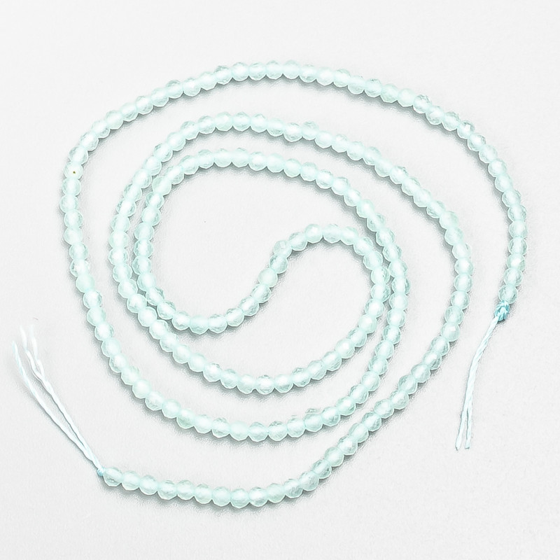 Small synthetic spinel beads, light azure, faceted round beads, 2 mm diameter, on a strand, 37 cm long