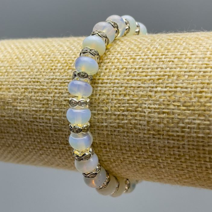 Браслет Місячне каміння (синтетичний) гладкий рондель, діаметр 8х5 мм+-, довжина 18см (стрейч), з білими стразами