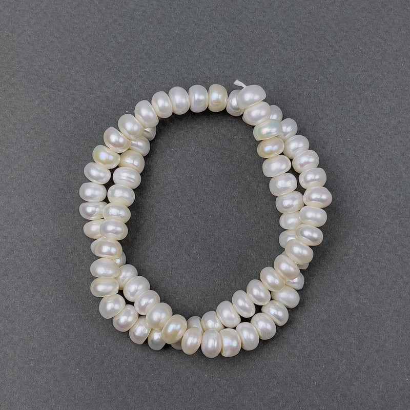 Freshwater oval pearls on a thread, 8x5 mm, length about 37 cm
