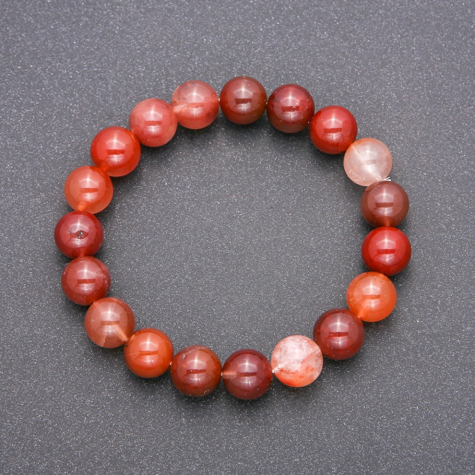 Bracelet with natural red rutile quartz on an elastic band, smooth beads, diameter approx. 10 mm, length 18 cm
