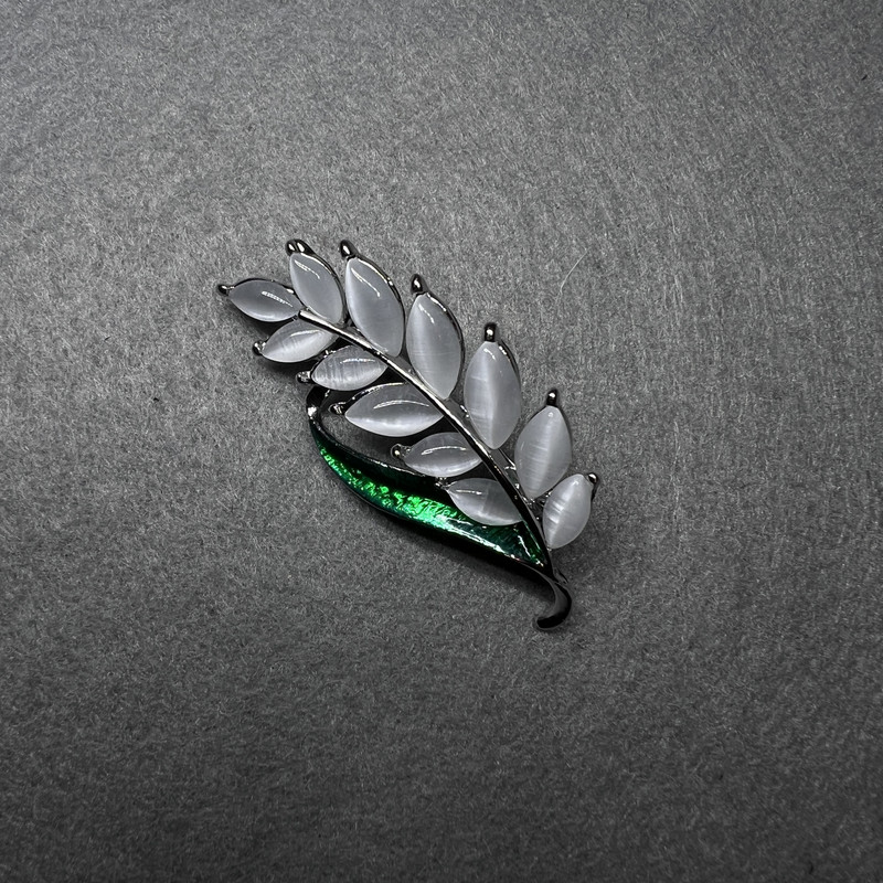 Brooch Sprig with White Cat's Eye, Green Enamel, Gold-Tone Metal 22x47mm